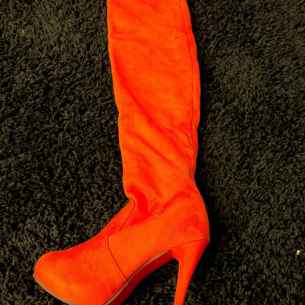 Orange suede thigh high boots